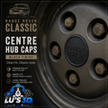 Range Rover Classic center hub caps in black finish, shown installed on a dark metallic wheel with visible lug nuts. The graphic includes text reading 'Range Rover Classic', 'Center Hub Caps', 'Black Finish', and a 'Lu's 3D' logo at the bottom.